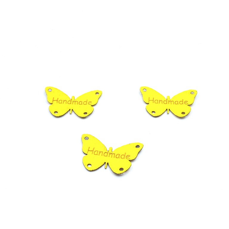 Naszywka z ekoskóry żółta we wzorze motyla. Delikatna ozdoba odzieżowa.