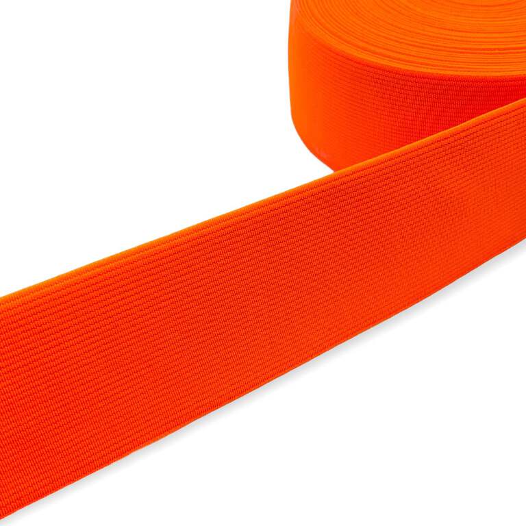 Guma tkana odzieżowa w kolorze pomarańczowym fluorescencyjnym. Mocna, elastyczna guma.