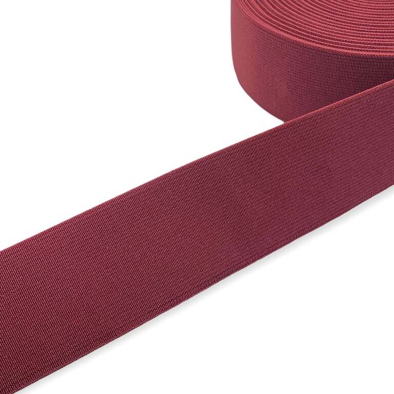 Tkana guma odzieżowa - twarda taśma elastyczna w kolorze bordowym.