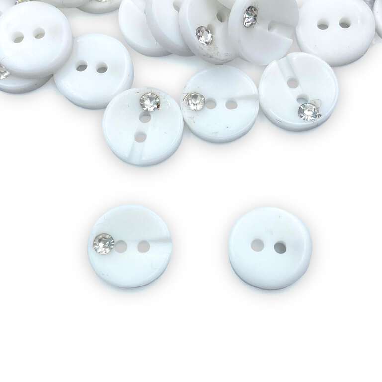 Białe guziki plastikowe ozdobne